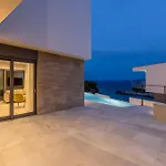 Beachfront Luxury Luce, Featuring A Heated Pool, Fitness Area, And Sauna Villa