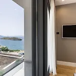 Villa Beachfront Luxury Luce, Featuring A Heated Pool, Fitness Area, And Sauna