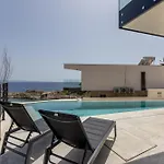 Villa Beachfront Luxury Luce, Featuring A Heated Pool, Fitness Area, And Sauna
