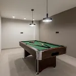 Beachfront Luxury Luce, Featuring A Heated Pool, Fitness Area, And Sauna Villa