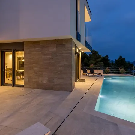 Villa Beachfront Luxury Luce, Featuring A Heated Pool, Fitness Area, And Sauna