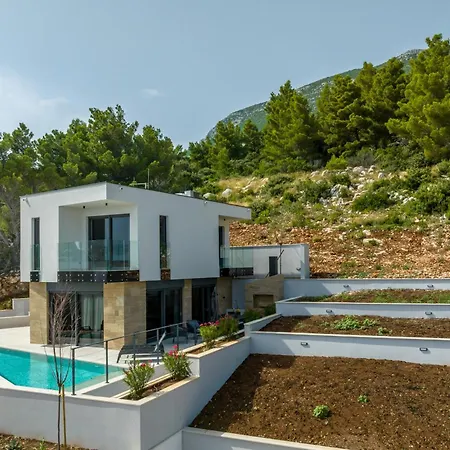 Villa Beachfront Luxury Luce, Featuring A Heated Pool, Fitness Area, And Sauna