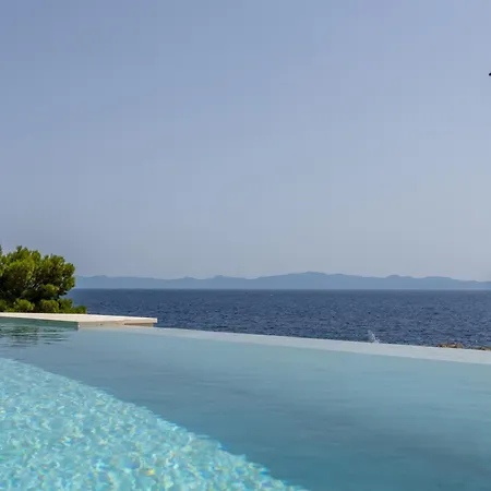 Beachfront Luxury Luce, Featuring A Heated Pool, Fitness Area, And Sauna