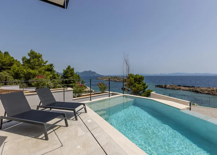 Beachfront Luxury Luce, Featuring A Heated Pool, Fitness Area, And Sauna