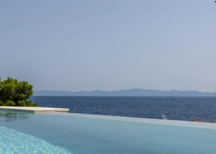 Beachfront Luxury Luce, Featuring A Heated Pool, Fitness Area, And Sauna