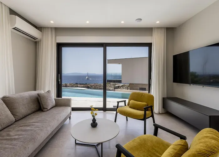 Beachfront Luxury Luce, Featuring A Heated Pool, Fitness Area, And Sauna