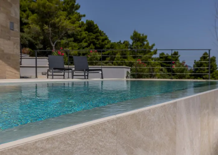 Beachfront Luxury Luce, Featuring A Heated Pool, Fitness Area, And Sauna